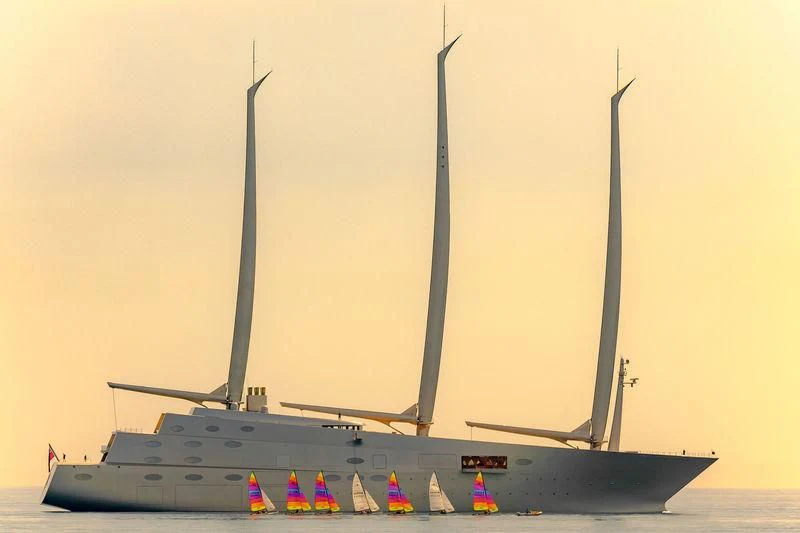 a large white boat with a tall antenna on top aboard SAILING YACHT A Yacht for Sale