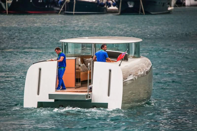 two men in a boat aboard SAILING YACHT A Yacht for Sale