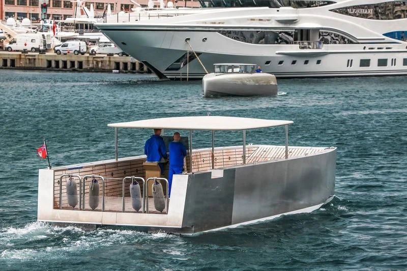 a couple of people on a dock aboard SAILING YACHT A Yacht for Sale