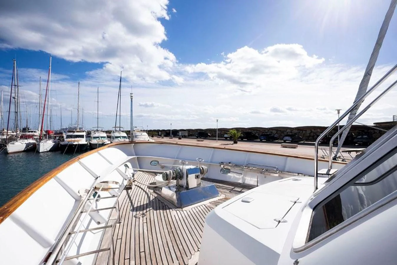 a marina with many boats aboard MAXIME Yacht for Sale