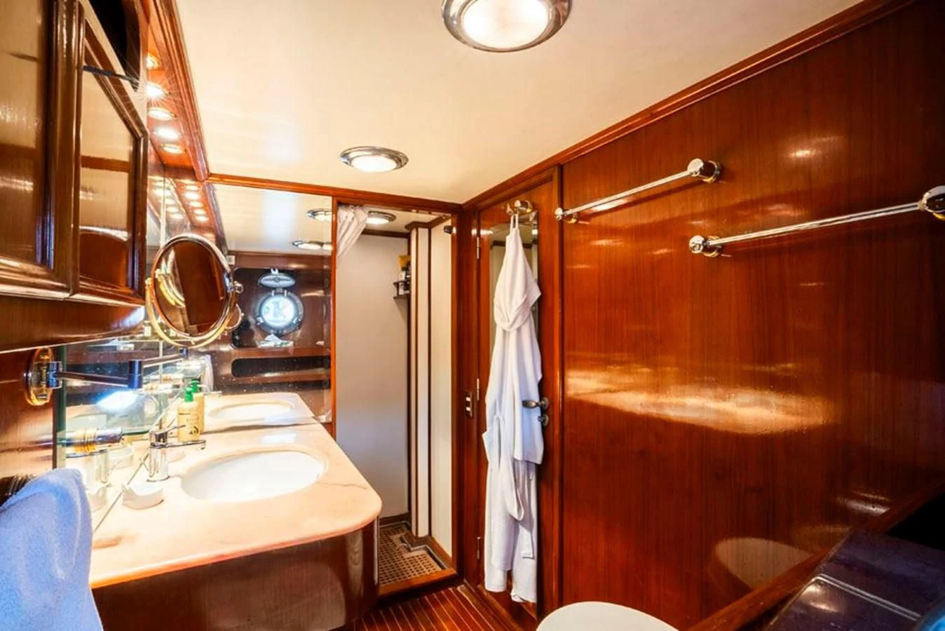a bathroom with a sink and a mirror aboard MAXIME Yacht for Sale