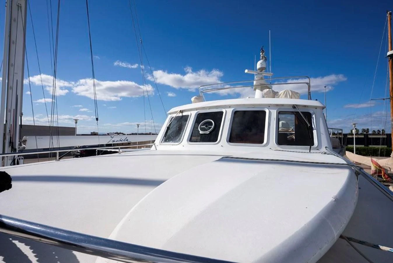 a white yacht on the water aboard MAXIME Yacht for Sale