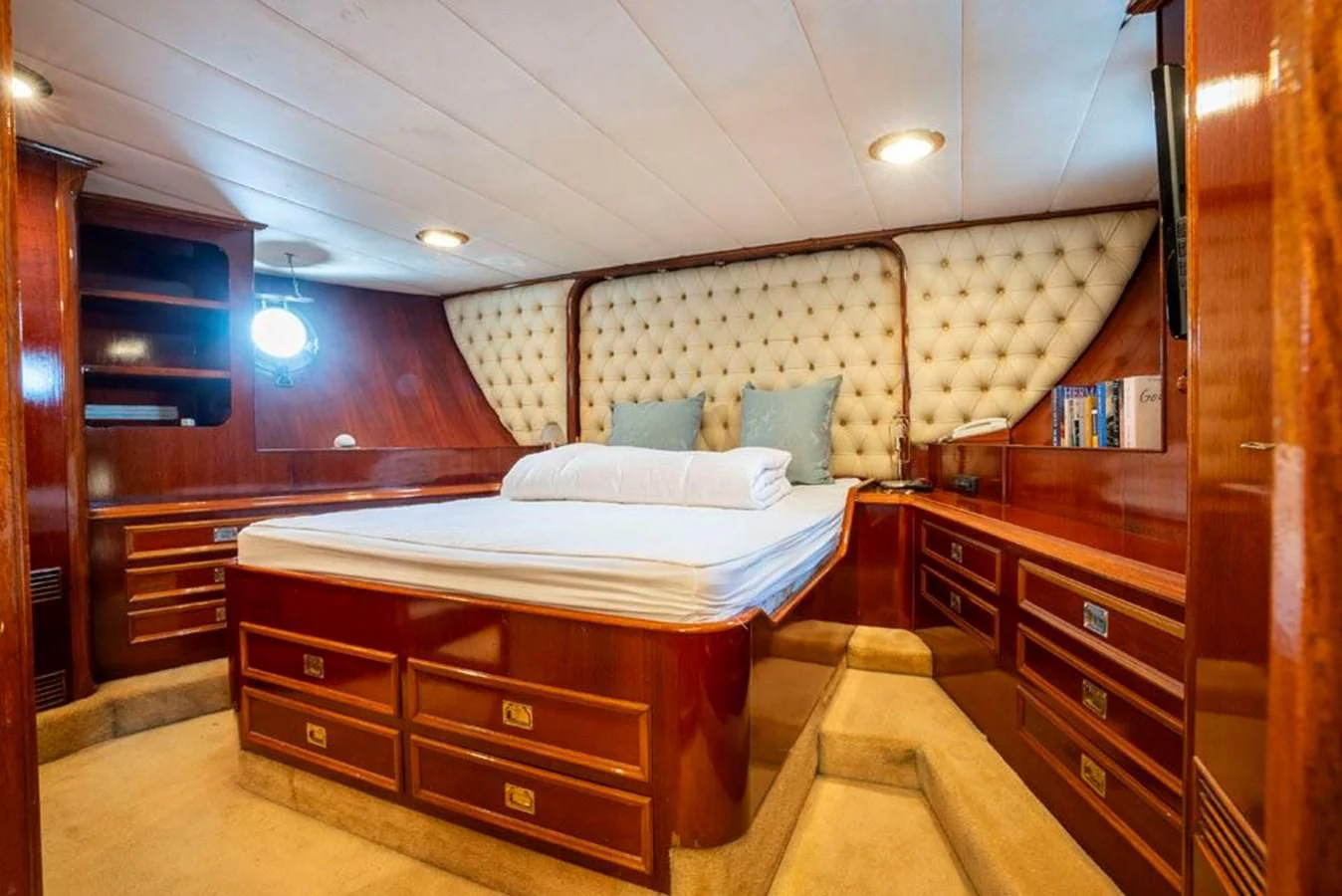 a bed in a room aboard MAXIME Yacht for Sale