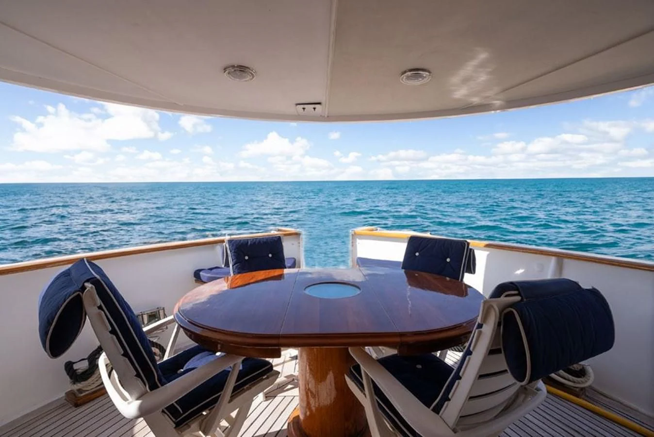 a table on a boat aboard MAXIME Yacht for Sale
