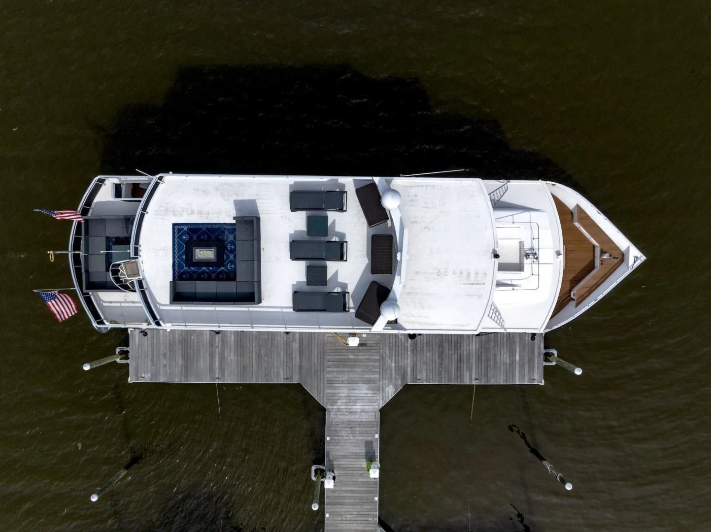 a building with a flag on the roof aboard KNOT TIDE DOWN Yacht for Sale