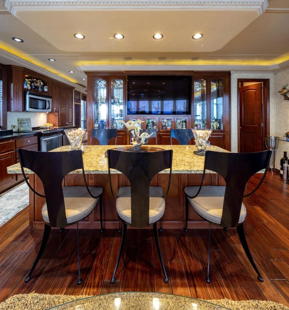 a bar with a table and chairs aboard KNOT TIDE DOWN Yacht for Sale