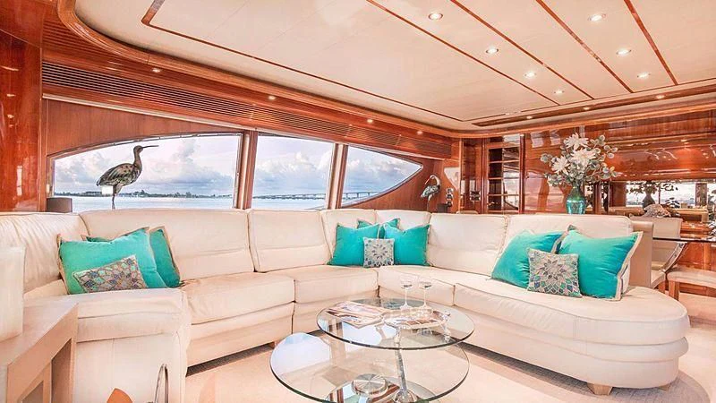 a living room with a large sofa aboard NOAH'S Yacht for Sale