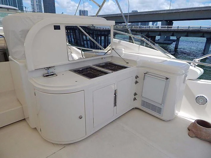 a white machine on a deck aboard NOAH'S Yacht for Sale
