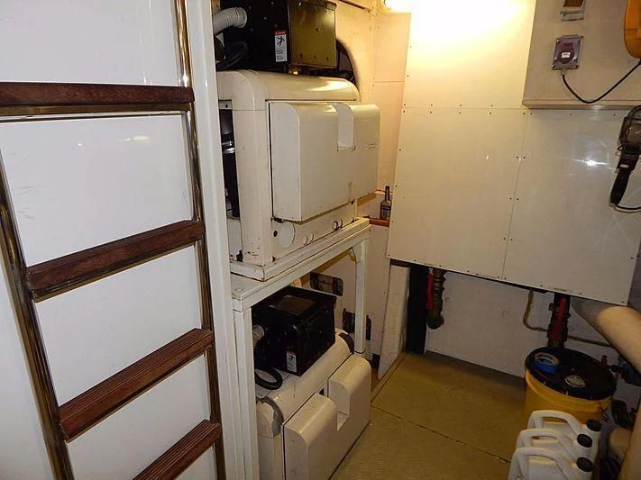 a room with a white machine aboard NOAH'S Yacht for Sale