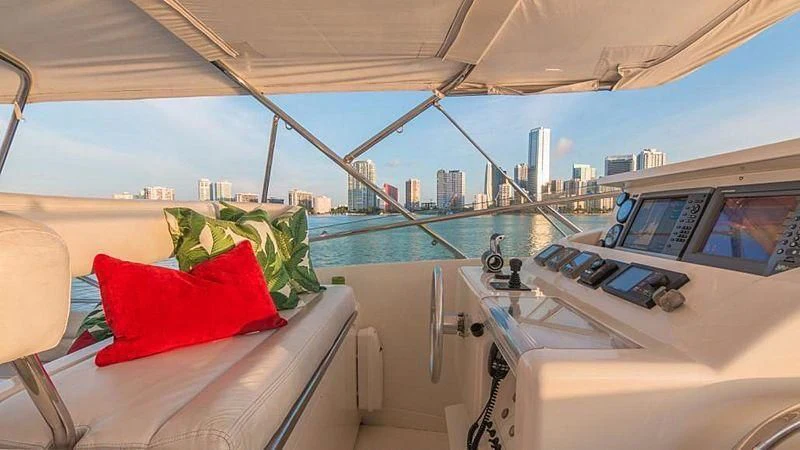 a boat with a red pillow on the deck aboard NOAH'S Yacht for Sale