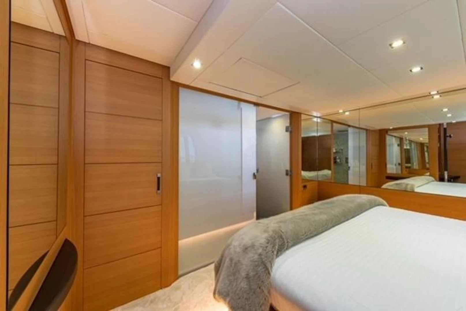 a room with a bed and a closet aboard RAW 2-HP Yacht for Sale