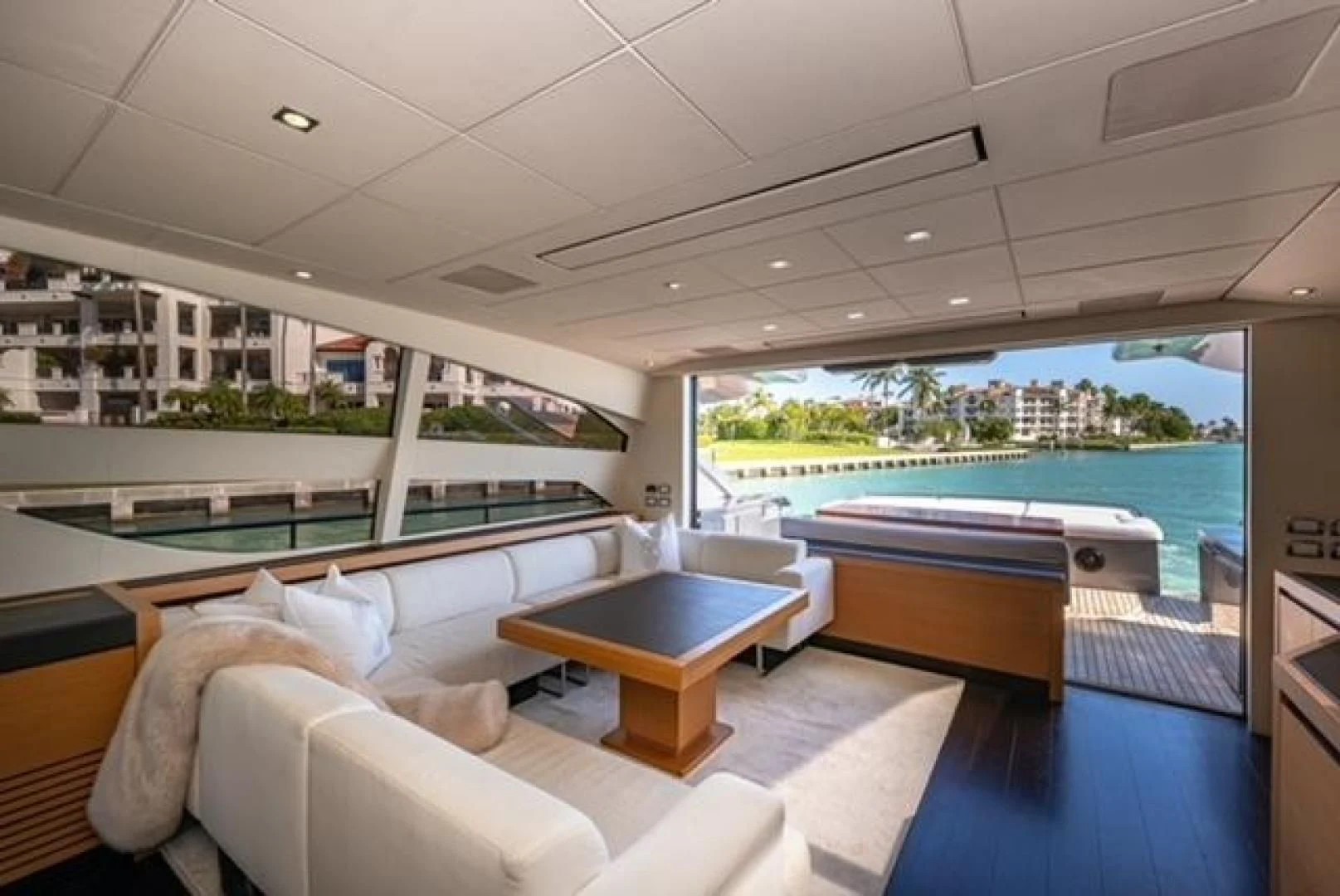 a room with a bed and a table aboard RAW 2-HP Yacht for Sale
