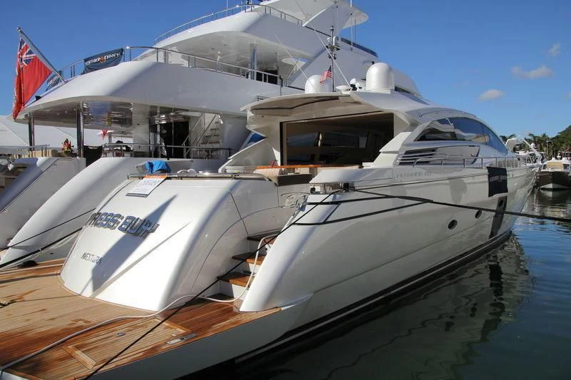 a boat docked at a pier aboard RAW 2-HP Yacht for Sale