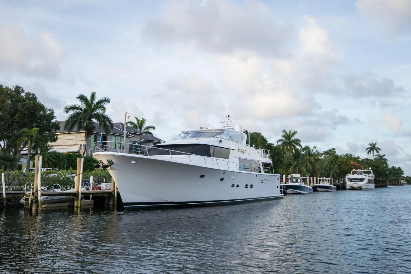 a boat docked at a pier aboard LIFE'S A JOURNEY Yacht for Sale