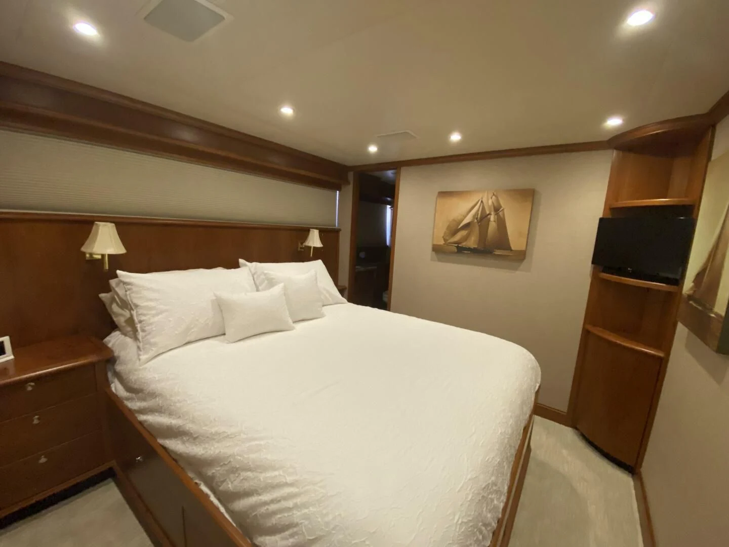 a bed with white sheets aboard LIFE'S A JOURNEY Yacht for Sale
