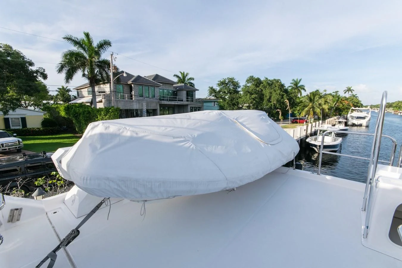 a white umbrella on a boat aboard LIFE'S A JOURNEY Yacht for Sale
