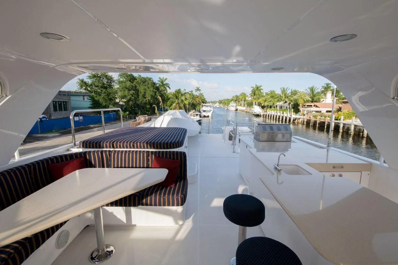 a room with a pool and a view of the water aboard LIFE'S A JOURNEY Yacht for Sale