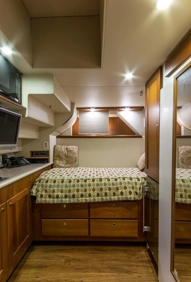 a bed in a room aboard LIFE'S A JOURNEY Yacht for Sale