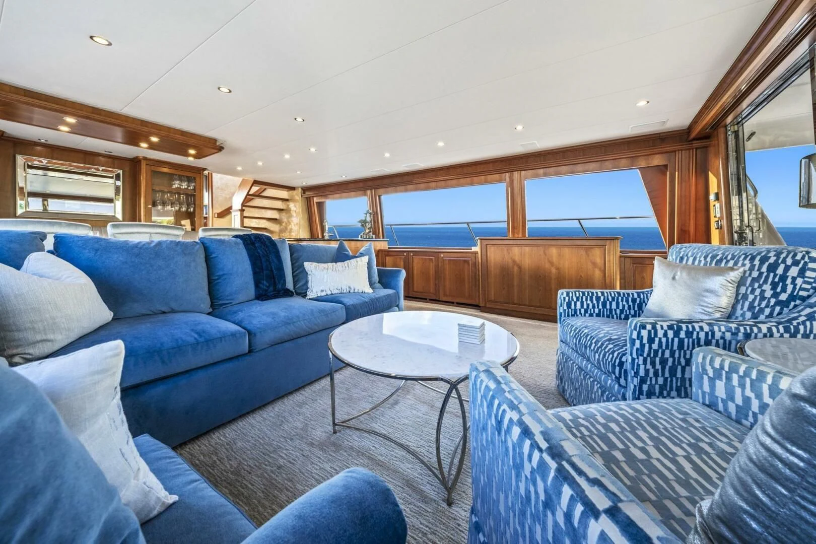 a living room with a couch and a table aboard LIFE'S A JOURNEY Yacht for Sale