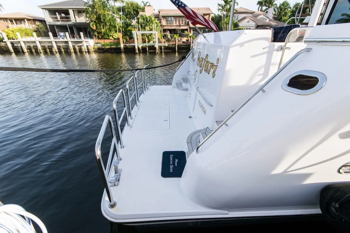 a white boat on the water aboard LIFE'S A JOURNEY Yacht for Sale