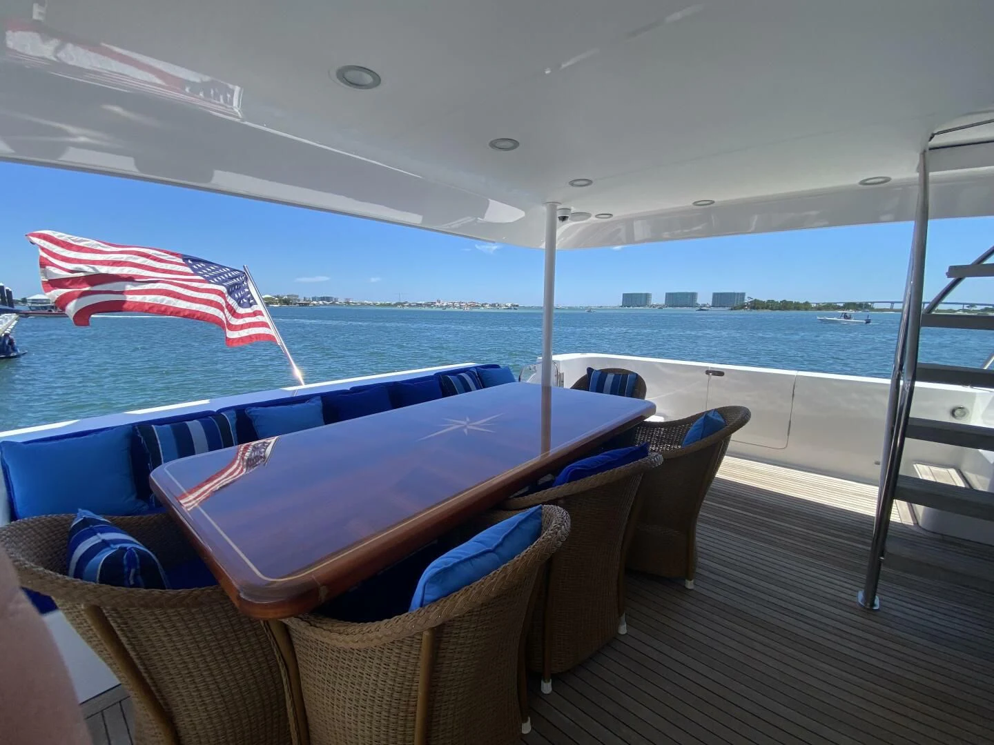 a deck with chairs and umbrellas aboard LIFE'S A JOURNEY Yacht for Sale