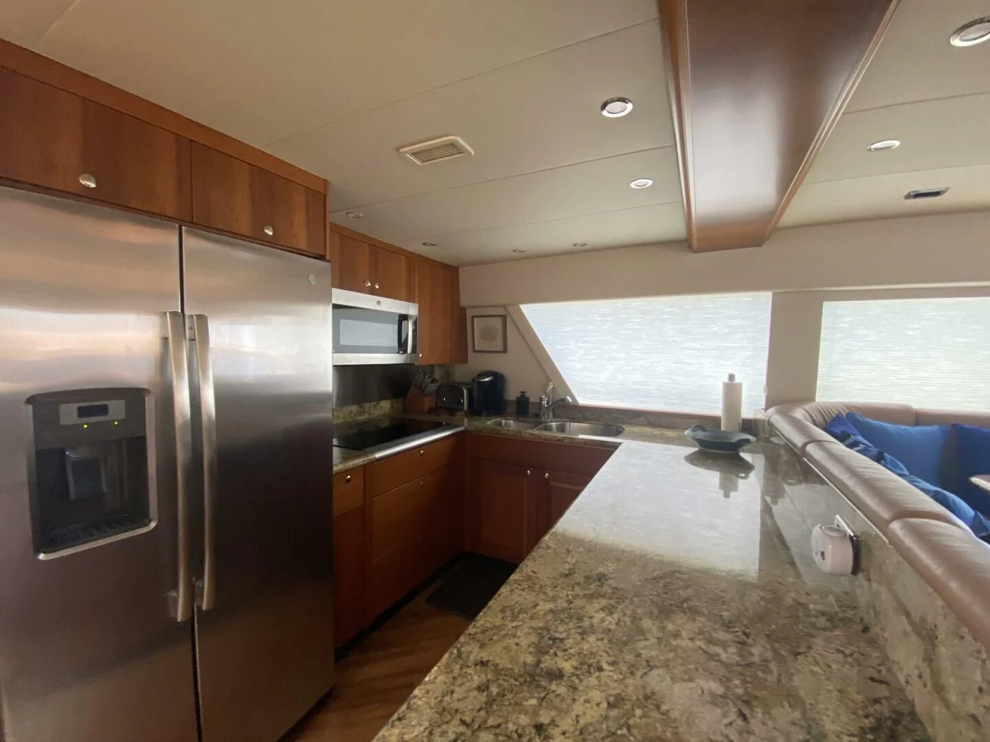 a kitchen with a large island aboard LIFE'S A JOURNEY Yacht for Sale