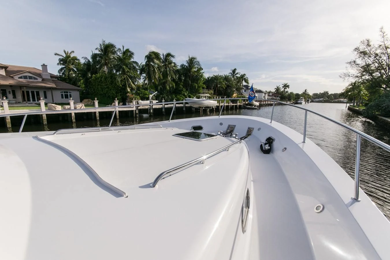 a white boat on a body of water aboard LIFE'S A JOURNEY Yacht for Sale