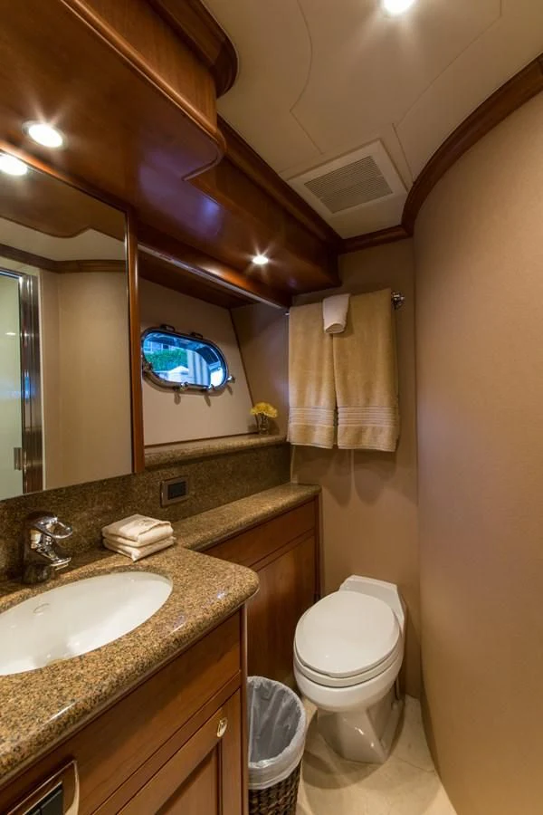 a bathroom with a blue shower aboard LIFE'S A JOURNEY Yacht for Sale