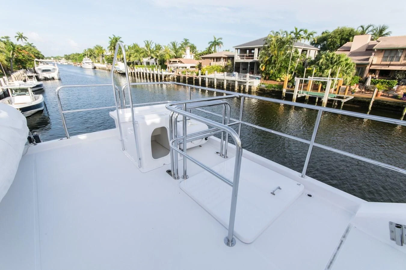 a white boat in a body of water aboard LIFE'S A JOURNEY Yacht for Sale