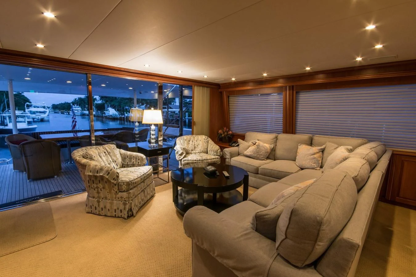 a living room with a large window aboard LIFE'S A JOURNEY Yacht for Sale