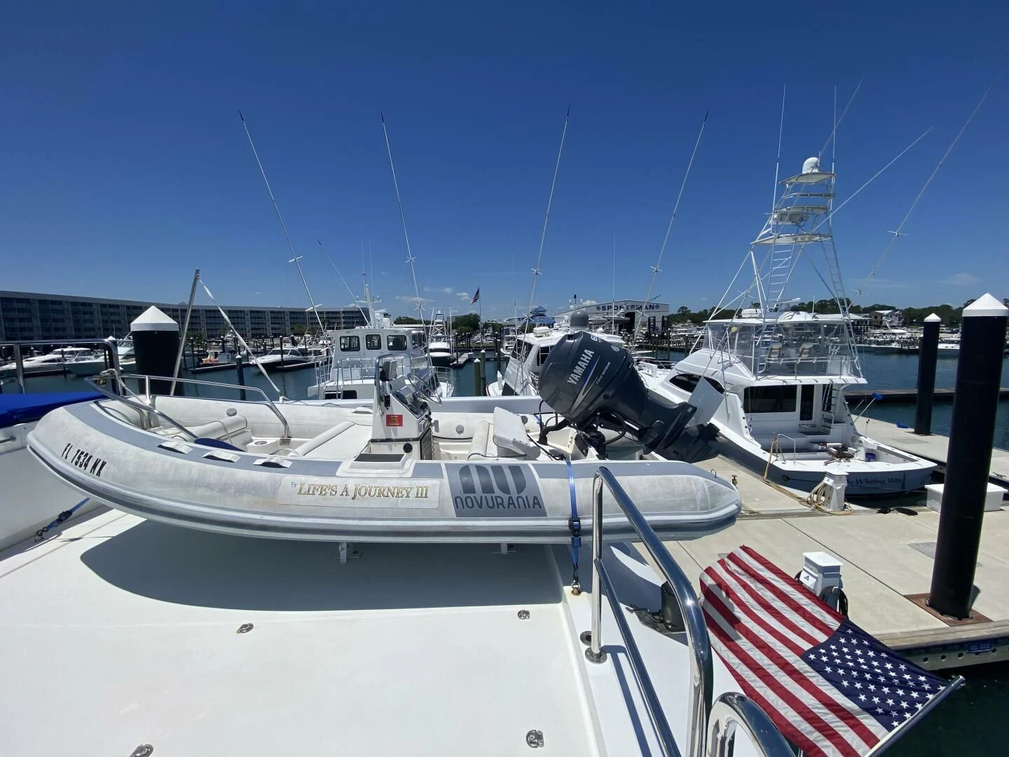 a boat docked at a pier aboard LIFE'S A JOURNEY Yacht for Sale
