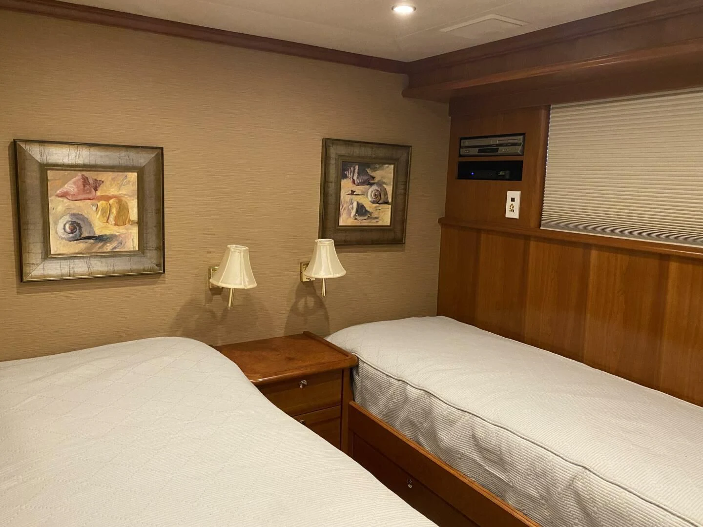 a couple of beds in a hotel room aboard LIFE'S A JOURNEY Yacht for Sale