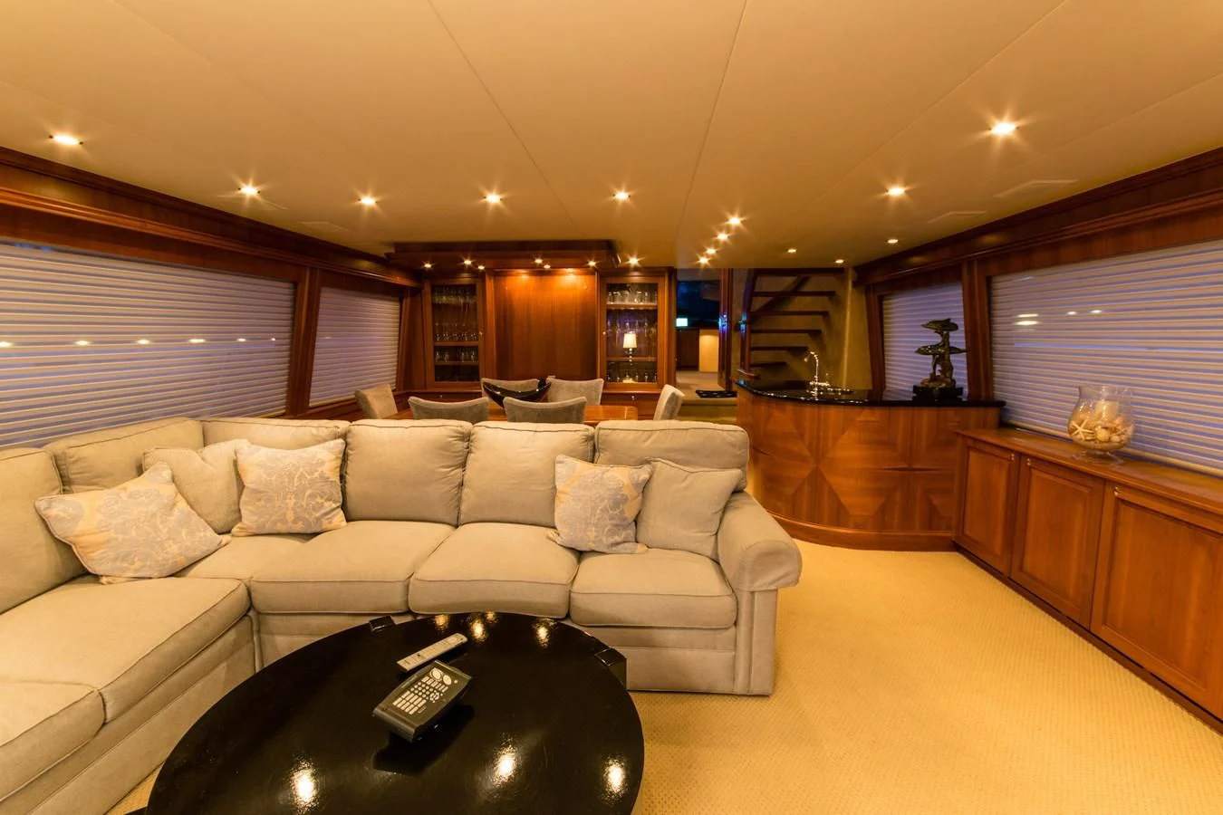 a living room with a couch and a coffee table aboard LIFE'S A JOURNEY Yacht for Sale