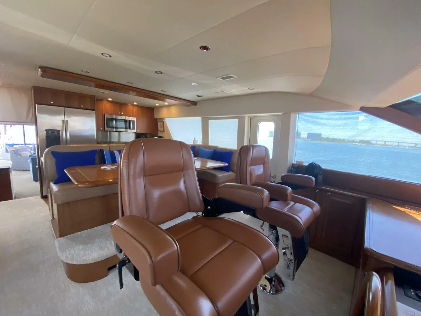 inside of a vehicle with chairs and a table and a window aboard LIFE'S A JOURNEY Yacht for Sale
