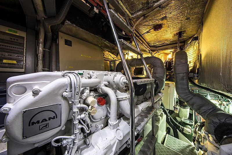 a machine with a large metal object aboard OSCAR Yacht for Sale