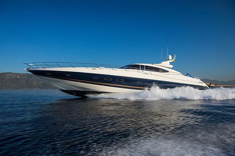 a large white ship on water aboard OSCAR Yacht for Sale