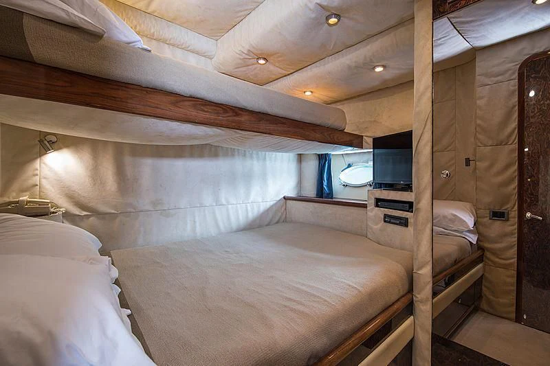 a small cabin with a bed aboard OSCAR Yacht for Sale