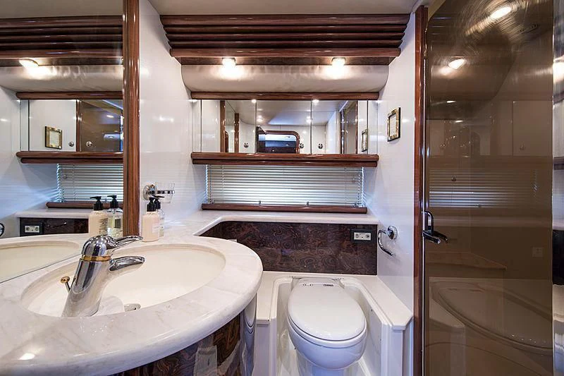 a bathroom with a sink and a toilet aboard OSCAR Yacht for Sale
