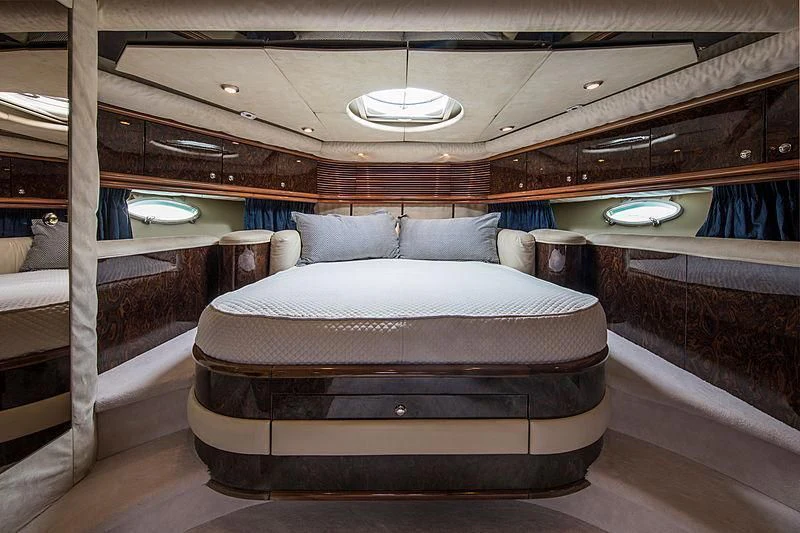a bed in a room aboard OSCAR Yacht for Sale