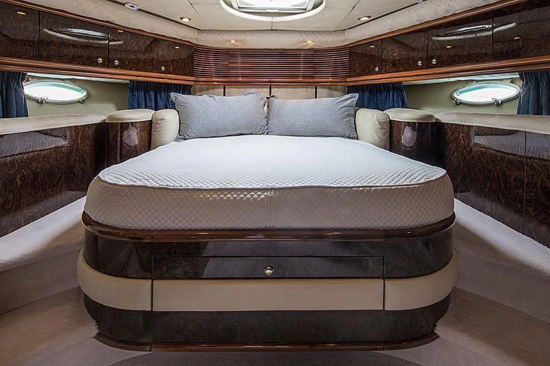 a bed in a room aboard OSCAR Yacht for Sale
