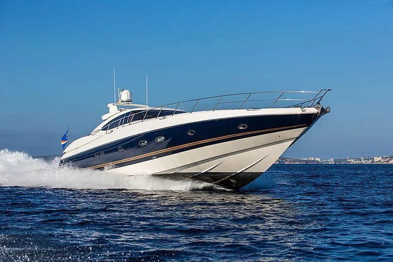a large white boat on the water aboard OSCAR Yacht for Sale