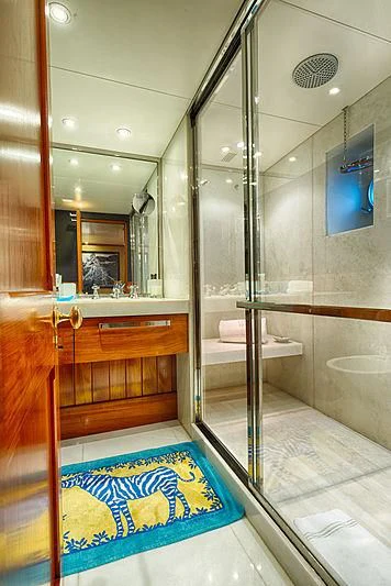 a bathroom with a glass shower aboard JURA II Yacht for Sale