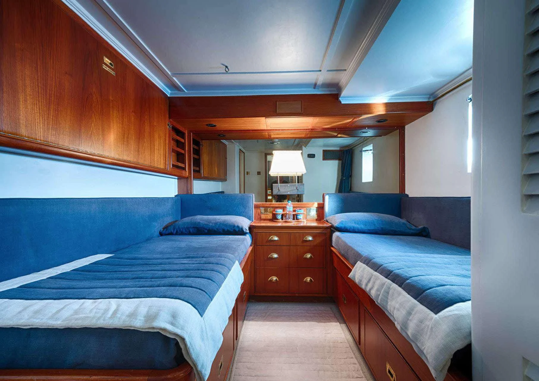 a room with two beds aboard JURA II Yacht for Sale