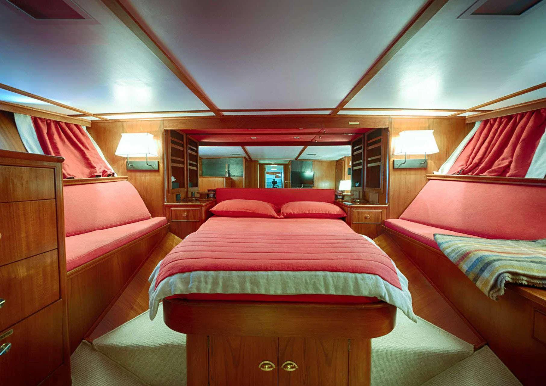 a room with two beds aboard JURA II Yacht for Sale
