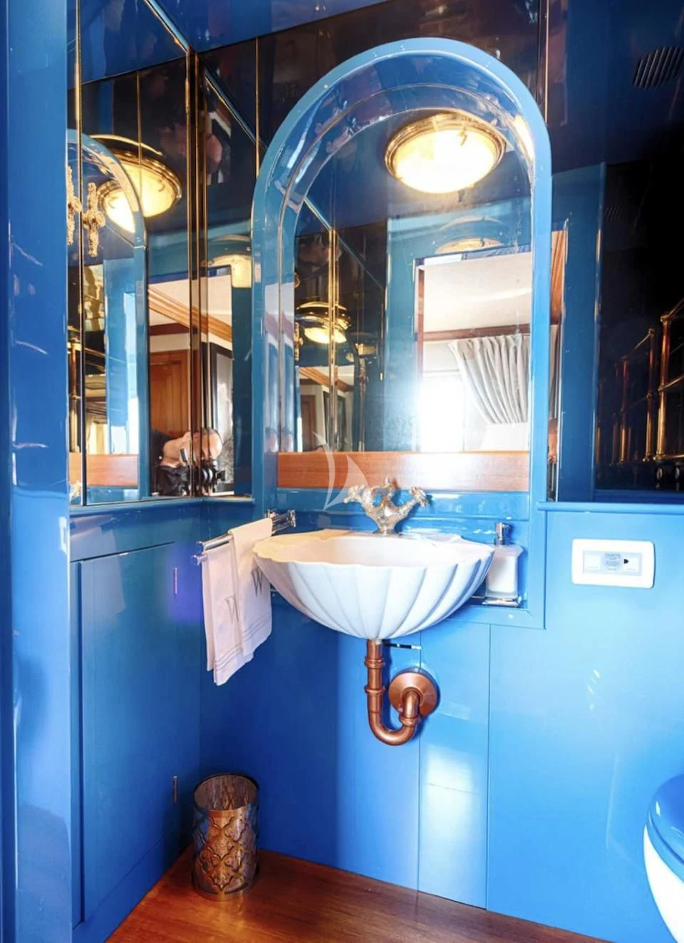a bathroom with a large mirror aboard JURA II Yacht for Sale