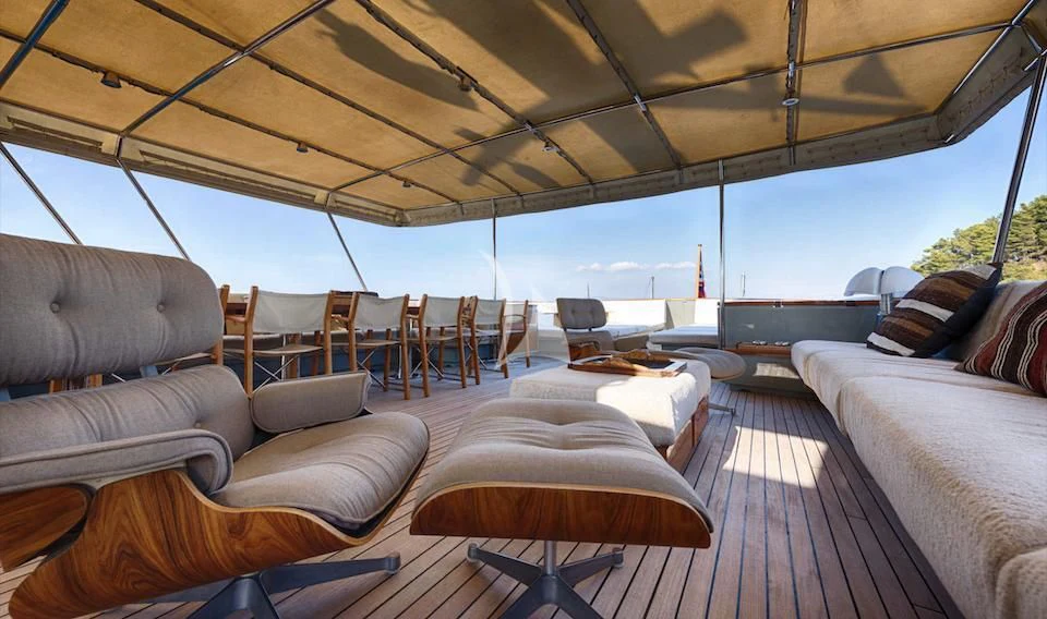 a large living room with a large window aboard JURA II Yacht for Sale