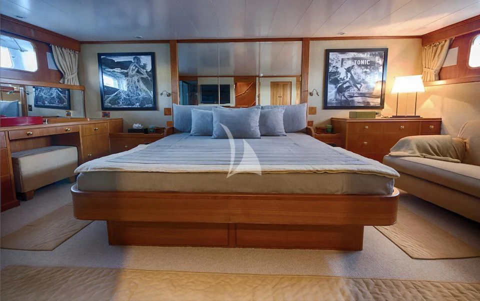 a bed in a hotel room aboard JURA II Yacht for Sale