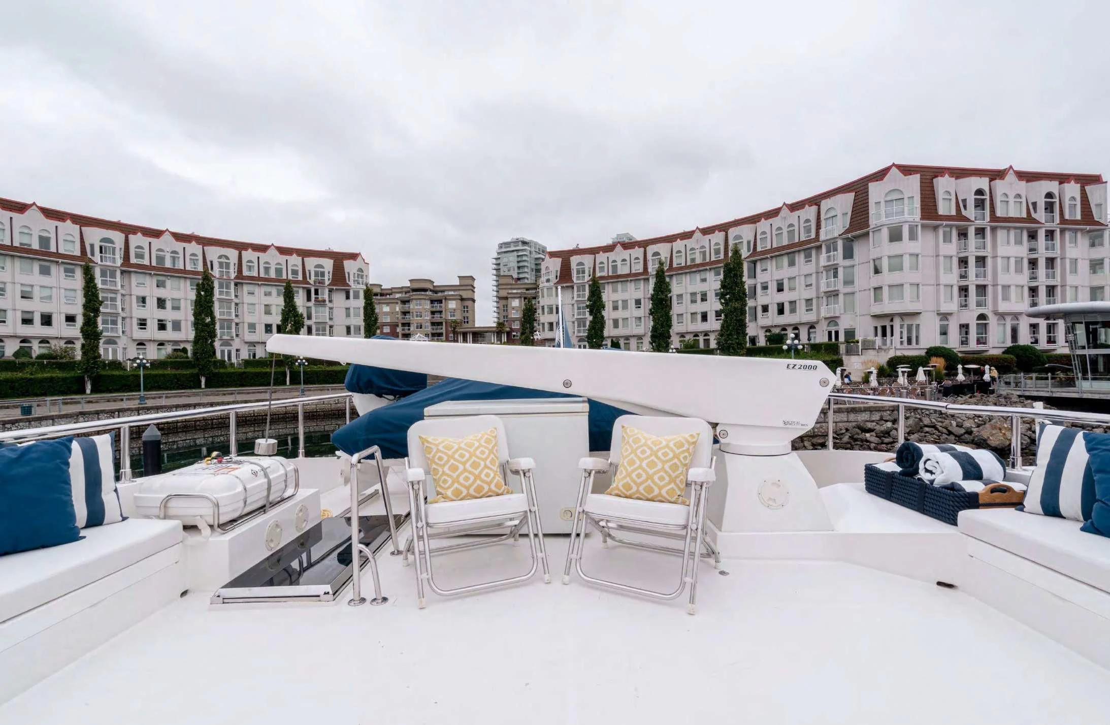a group of chairs and tables outside aboard HAPPINESS II Yacht for Sale