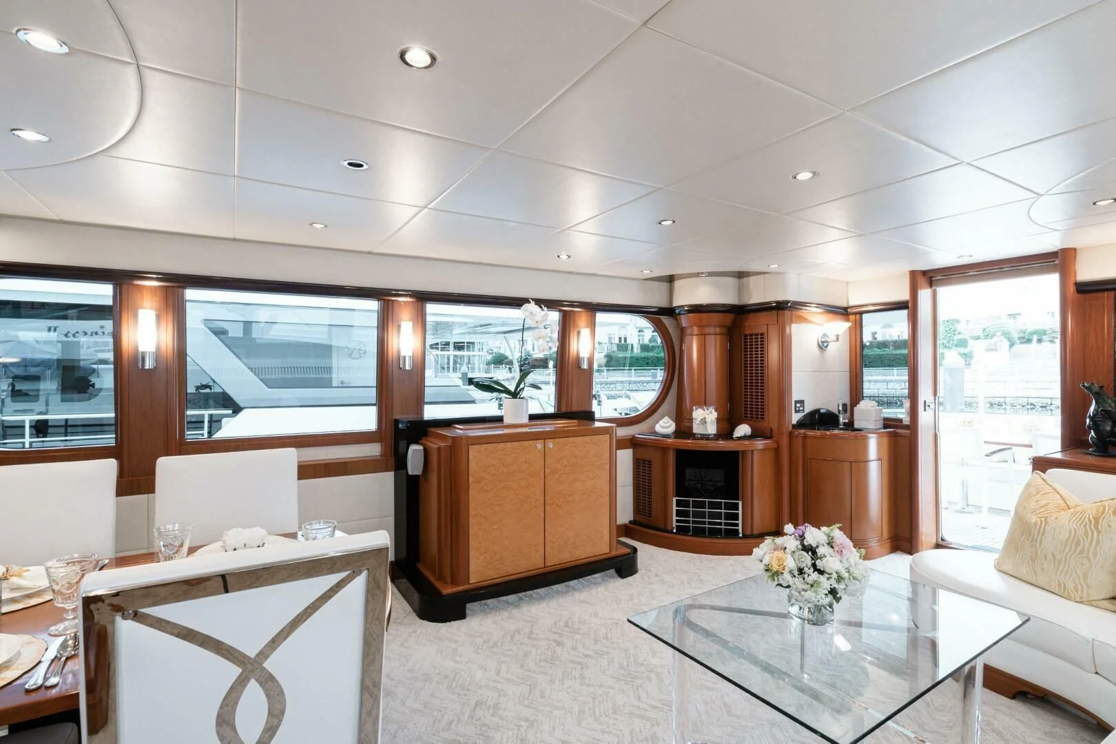 a living room with a large window aboard HAPPINESS II Yacht for Sale