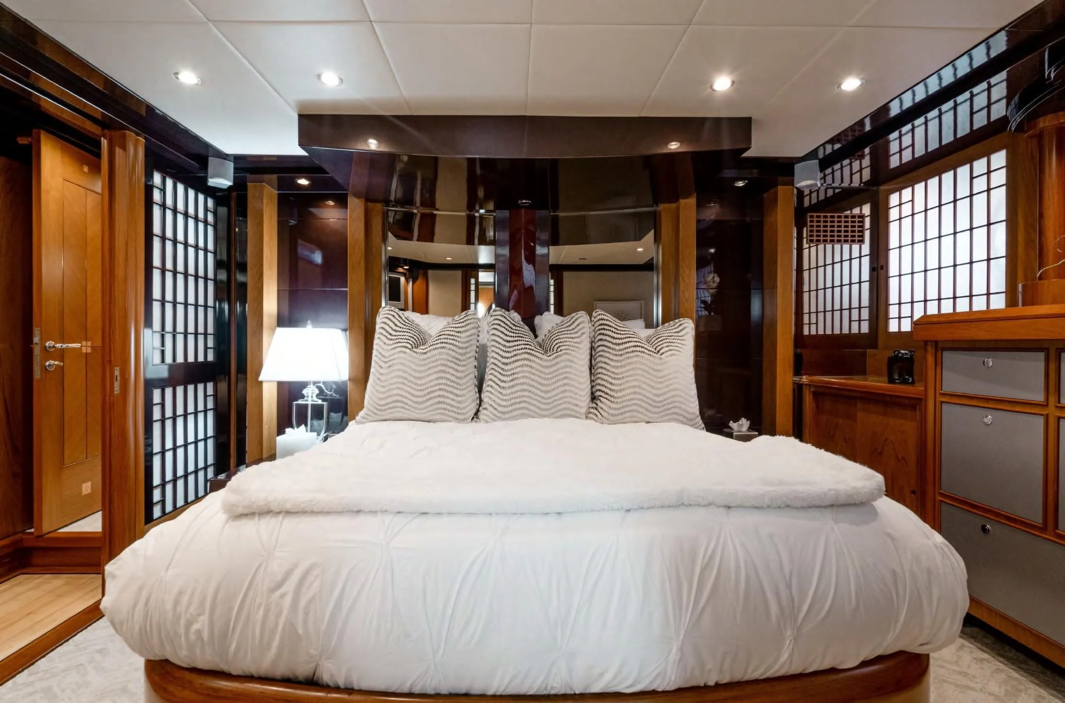a large bed in a room aboard HAPPINESS II Yacht for Sale